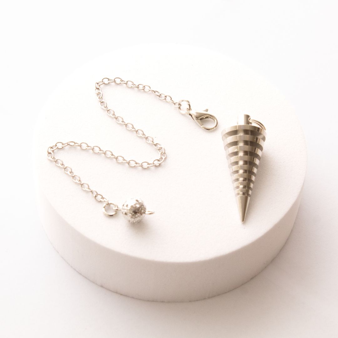 Péndulo Metal Vórtice Plateado