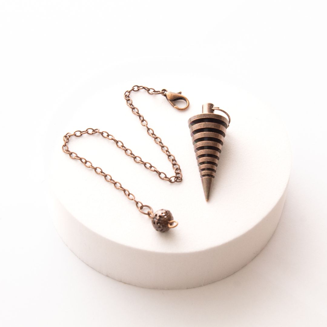 Péndulo Metal Vórtice Cobre Antiguo