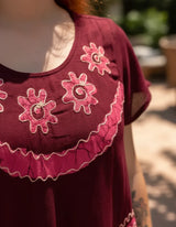 Blusa Vestido Deepa Burdeo con Rosa